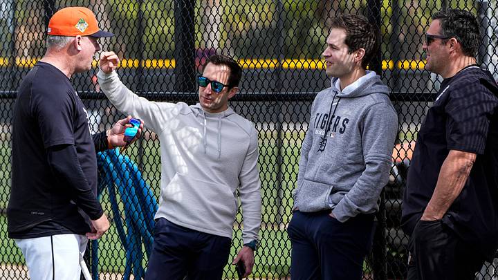 Detroit Tigers manager A.J. Hinch, left, talks to general manager Jeff Greenberg, president of baseball operations Scott Harris and vice president, assistant general manager Ryan Garko during spring training at TigerTown in Lakeland, Fla. on Monday, Feb. 16, 2026.