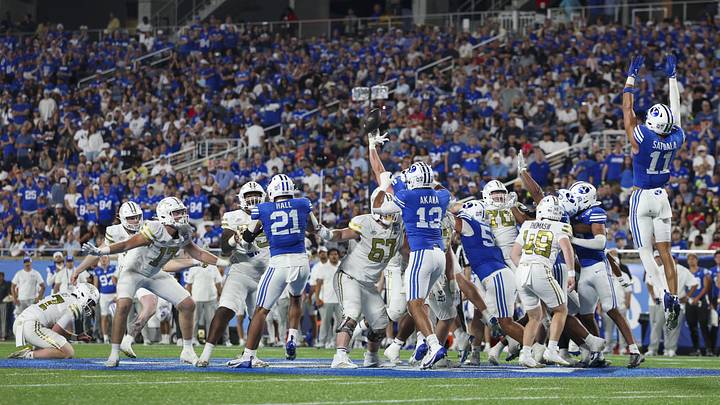 Dec 27, 2025; Orlando, FL, USA; BYU Cougars defensive tackle Keanu Tanuvasa (57) blocks a field goal attempt against the Georgia Tech Yellow Jackets in the third quarter during the Pop-Tarts Bowl at Camping World Stadium. Mandatory Credit: Nathan Ray Seebeck-Imagn Images