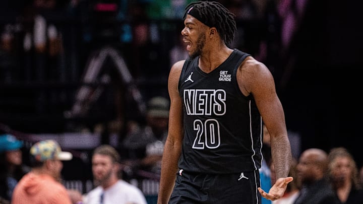 Mar 8, 2025; Charlotte, North Carolina, USA; Brooklyn Nets center Day'Ron Sharpe (20) argues for a foul during the third quarter against the Charlotte Hornets at Spectrum Center. Mandatory Credit: Scott Kinser-Imagn Images