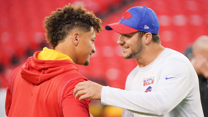 Oct 10, 2021; Kansas City, Missouri, USA; Kansas City Chiefs quarterback Patrick Mahomes (15) talks with Buffalo Bills quarterback Josh Allen (17) before warm ups at GEHA Field at Arrowhead Stadium. Mandatory Credit: Denny Medley-Imagn Images