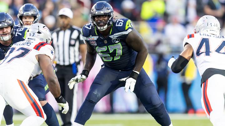Seattle Seahawks offensive tackle Charles Cross (67) against the New England Patriots. Seattle Seahawks offensive tackle Charles Cross (67) against the New England Patriots.
