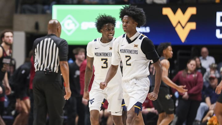 Nov 17, 2025; Morgantown, West Virginia, USA; West Virginia Mountaineers guard Honor Huff (3) celebrates with West Virginia Mountaineers guard Amir Jenkins (2) during the second half against the Lafayette Leopards at WVU Coliseum. Mandatory Credit: Ben Queen-Imagn Images Nov 17, 2025; Morgantown, West Virginia, USA; West Virginia Mountaineers guard Honor Huff (3) celebrates with West Virginia Mountaineers guard Amir Jenkins (2) during the second half against the Lafayette Leopards at WVU Coliseum. Mandatory Credit: Ben Queen-Imagn Images