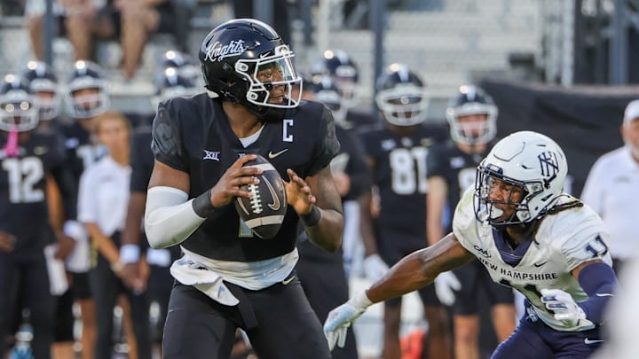 Aug 29, 2024; Orlando, Florida, USA; UCF Knights quarterback KJ Jefferson (1) looks to pass during the first quarter against the New Hampshire Wildcats at FBC Mortgage Stadium. Mandatory Credit: Mike Watters-USA TODAY Sports