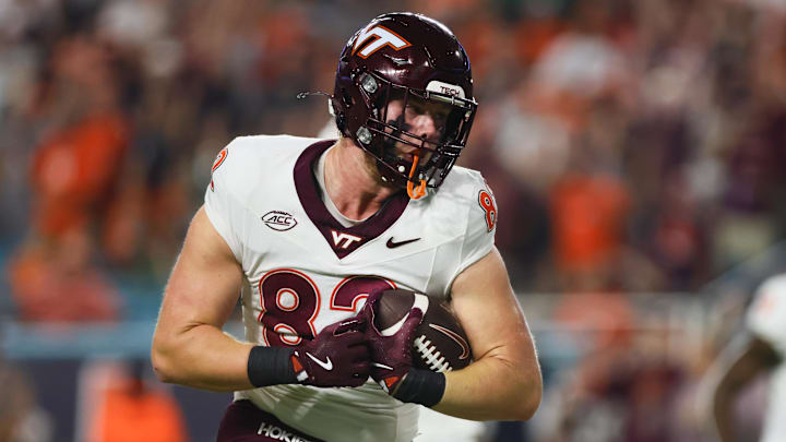 Sep 27, 2024; Virginia Tech tight end Benji Gosnell (82) catches the football for a touchdown against Miami at Hard Rock Stadium.