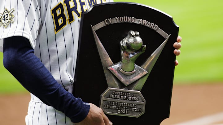 Apr 15, 2022; Milwaukee, Wisconsin, USA;  Milwaukee Brewers manager Craig Counsell holds the Cy