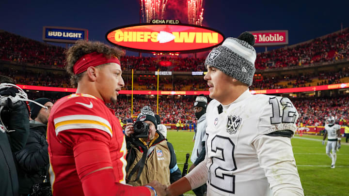 Nov 29, 2024; Kansas City, Missouri, USA; Kansas City Chiefs quarterback Patrick Mahomes (15) shakes hands with Las Vegas Raiders quarterback Aidan O'Connell (12) after the game at GEHA Field at Arrowhead Stadium. Mandatory Credit: Denny Medley-Imagn Images