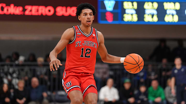 Feb 12, 2025; Villanova, Pennsylvania, USA; Saint John's Red Storm guard RJ Luis Jr (12) controls the ball against the Villanova Wildcats in the second half at William B. Finneran Pavilion. Mandatory Credit: Kyle Ross-Imagn Images