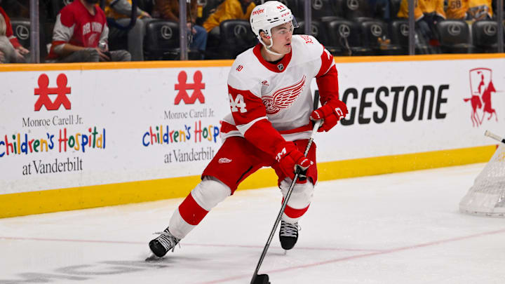 Mar 2, 2026; Nashville, Tennessee, USA;  Detroit Red Wings defenseman Axel Sandin-Pellikka (44) skates behind the net against the Detroit Red Wings during the third period at Bridgestone Arena. Mandatory Credit: Steve Roberts-Imagn Images