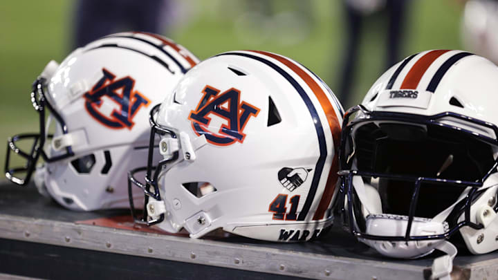 Oct 2, 2021; Baton Rouge, Louisiana, USA; Auburn Tigers helmets sits on a crate during a game against LSU Tigers at Tiger Stadium. Mandatory Credit: Stephen Lew-Imagn Images