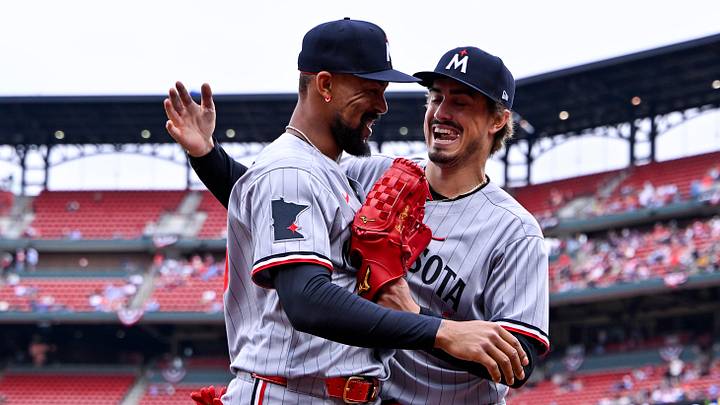 Mar 29, 2025; St. Louis, Missouri, USA;  Minnesota Twins starting pitcher Joe Ryan (41) congratulates center fielder Byron Buxton (25) after he made a leaping catch in the fifth inning against the St. Louis Cardinals at Busch Stadium. Mandatory Credit: Jeff Curry-Imagn Images