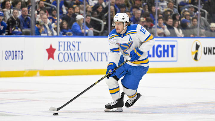 Dec 18, 2025; St. Louis, Missouri, USA; St. Louis Blues center Robert Thomas (18) controls the puck against the New York Rangers during the second period at Enterprise Center. Mandatory Credit: Jeff Curry-Imagn Images Dec 18, 2025; St. Louis, Missouri, USA; St. Louis Blues center Robert Thomas (18) controls the puck against the New York Rangers during the second period at Enterprise Center. Mandatory Credit: Jeff Curry-Imagn Images