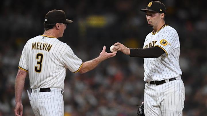 Aug 8, 2022; San Diego, California, USA; San Diego Padres manager Bob Melvin (3) takes the ball from