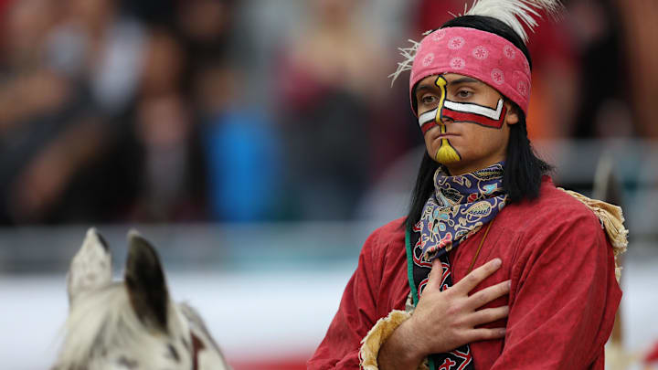 Dec 30, 2023; Miami Gardens, FL, USA; Florida State Seminoles mascot Chief Osceola and Renegade take the field before the game in the 2023 Orange Bowl against the Georgia Bulldogs at Hard Rock Stadium. Mandatory Credit: Nathan Ray Seebeck-Imagn Images