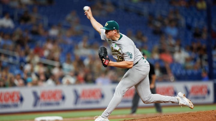 May 28, 2024; St. Petersburg, Florida, USA;  Oakland Athletics pitcher Mason Miller (19) throws a pitch  against the Tampa Bay Rays in the ninth inning at Tropicana Field. Mandatory Credit: Nathan Ray Seebeck-USA TODAY Sports