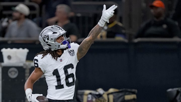 Dec 29, 2024; New Orleans, Louisiana, USA; Las Vegas Raiders wide receiver Jakobi Meyers (16) signals a first down against the New Orleans Saints at Caesars Superdome. Mandatory Credit: Matthew Hinton-Imagn Images