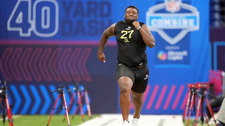 Feb 27, 2025; Indianapolis, IN, USA; Mississippi defensive lineman J.J. Pegues (DL27) participates in drills during the 2025 NFL Combine at Lucas Oil Stadium. Mandatory Credit: Kirby Lee-Imagn Images