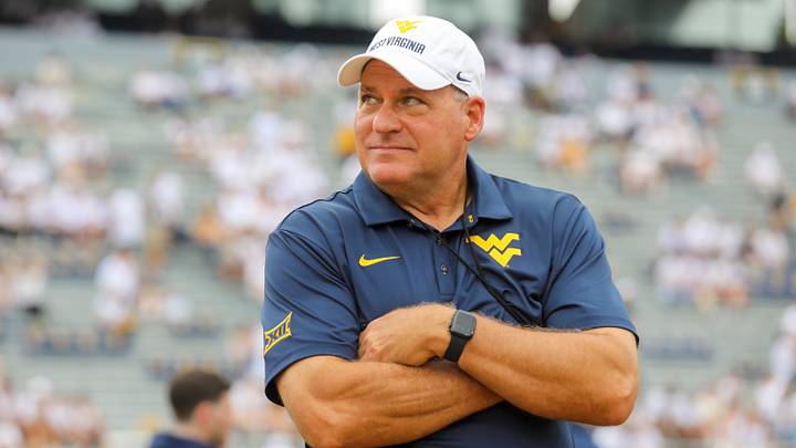 Sep 5, 2026; Morgantown, West Virginia, USA; West Virginia Mountaineers head coach Rich Rodriguez watches during warmups before their game against the Coastal Carolina Chanticleers at Milan Puskar Stadium. Mandatory Credit: Ben Queen-Imagn Images
