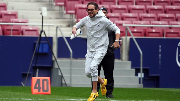 Miami Dolphins head coach Mike McDaniel watches during practice at Estadio Riyadh Air Metropolitano in Spain.