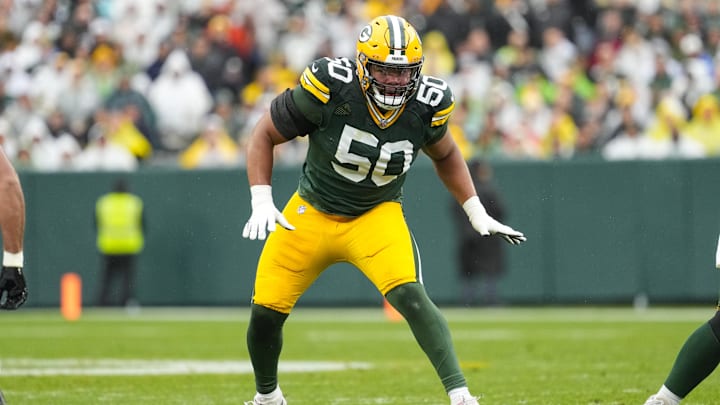 Oct 13, 2024; Green Bay, Wisconsin, USA;  Green Bay Packers offensive linenam Zach Tom (50) during the game against the Arizona Cardinals at Lambeau Field. Mandatory Credit: Jeff Hanisch-Imagn Images