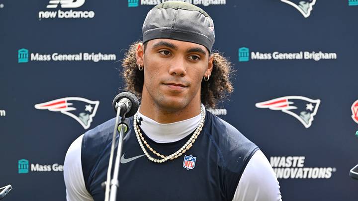 New England Patriots cornerback Christian Gonzalez (0) speaks to the media after practice at training camp. New England Patriots cornerback Christian Gonzalez (0) speaks to the media after practice at training camp.