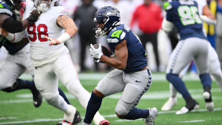 Nov 24, 2024; Seattle, Washington, USA; Seattle Seahawks running back Kenneth Walker III (9) carries the ball against the Arizona Cardinals during the first half at Lumen Field. Mandatory Credit: Steven Bisig-Imagn Images Nov 24, 2024; Seattle, Washington, USA; Seattle Seahawks running back Kenneth Walker III (9) carries the ball against the Arizona Cardinals during the first half at Lumen Field. Mandatory Credit: Steven Bisig-Imagn Images
