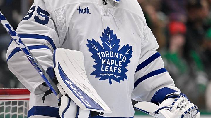 Dec 21, 2025; Dallas, Texas, USA; A view of the logo on the jersey of Toronto Maple Leafs goaltender Dennis Hildeby (35) during the game at the American Airlines Center. Mandatory Credit: Jerome Miron-Imagn Images Dec 21, 2025; Dallas, Texas, USA; A view of the logo on the jersey of Toronto Maple Leafs goaltender Dennis Hildeby (35) during the game at the American Airlines Center. Mandatory Credit: Jerome Miron-Imagn Images