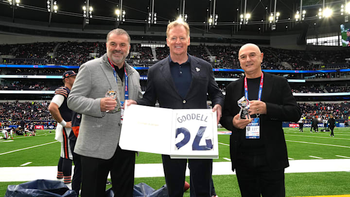 Oct 13, 2024; London, United Kingdom; NFL commissioner Roger Goodell (center) poses with Tottenham Hotspur coach Ange Postecoglou (left) and chairman Daniel Levy during an NFL International Series game at Tottenham Hotspur Stadium. Mandatory Credit: Kirby Lee-Imagn Images Oct 13, 2024; London, United Kingdom; NFL commissioner Roger Goodell (center) poses with Tottenham Hotspur coach Ange Postecoglou (left) and chairman Daniel Levy during an NFL International Series game at Tottenham Hotspur Stadium. Mandatory Credit: Kirby Lee-Imagn Images
