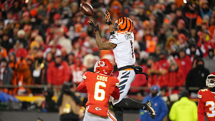 Jan 29, 2023; Kansas City, Missouri, USA; Cincinnati Bengals wide receiver Ja'Marr Chase (1) makes a catch against Kansas City Chiefs safety Bryan Cook (6) during the third quarter of the AFC Championship game at GEHA Field at Arrowhead Stadium. Mandatory Credit: Jay Biggerstaff-Imagn Images Jan 29, 2023; Kansas City, Missouri, USA; Cincinnati Bengals wide receiver Ja'Marr Chase (1) makes a catch against Kansas City Chiefs safety Bryan Cook (6) during the third quarter of the AFC Championship game at GEHA Field at Arrowhead Stadium. Mandatory Credit: Jay Biggerstaff-Imagn Images