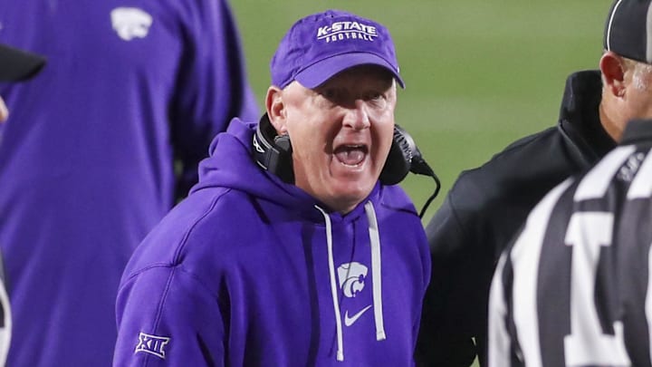 Oct 19, 2024; Morgantown, West Virginia, USA; Kansas State Wildcats head coach Chris Klieman argues a call during the second quarter against the West Virginia Mountaineers at Mountaineer Field at Milan Puskar Stadium. Mandatory Credit: Ben Queen-Imagn Images Oct 19, 2024; Morgantown, West Virginia, USA; Kansas State Wildcats head coach Chris Klieman argues a call during the second quarter against the West Virginia Mountaineers at Mountaineer Field at Milan Puskar Stadium. Mandatory Credit: Ben Queen-Imagn Images