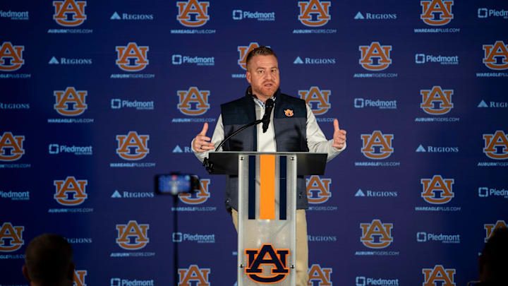 Auburn Tigers football head coach Alex Golesh speaks during a press conference at Woltosz Performance Center in Auburn, Ala. on Monday, Dec. 8, 2025.