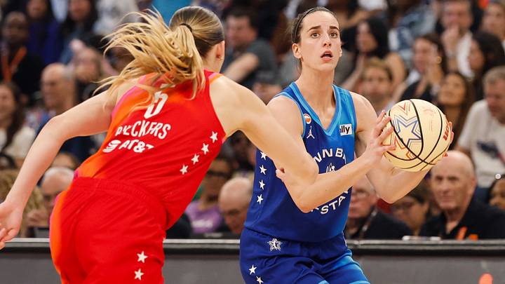 Jul 25, 2026; Chicago, Illinois, USA; Team Spoon guard Caitlin Clark (22) looks to shoot while defended by Team Coop guard Paige Bueckers (5) in the second half during the 2026 WNBA All Star Game at United Center. Mandatory Credit: Kamil Krzaczynski-Imagn Images