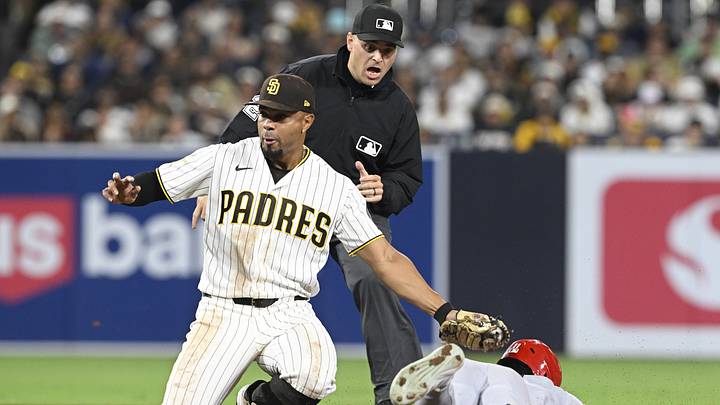 May 7, 2026; San Diego, California, USA; St. Louis Cardinals center fielder Victor Scott II (11) is tagged out by San Diego Padres shortstop Xander Bogaerts (2) as he tries to steal second base during the eighth inning at Petco Park. Mandatory Credit: Denis Poroy-Imagn Images