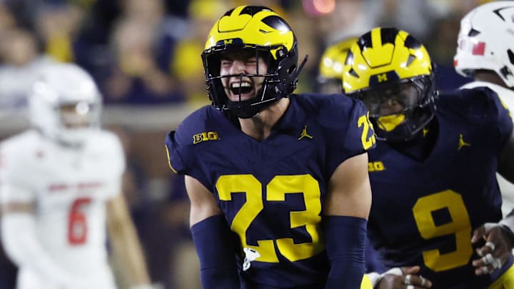 Aug 30, 2025; Ann Arbor, Michigan, USA;  Michigan Wolverines linebacker Cole Sullivan (23) celebrates after he sacks New Mexico Lobos quarterback Jack Layne (2) in the second half at Michigan Stadium. Mandatory Credit: Rick Osentoski-Imagn Images