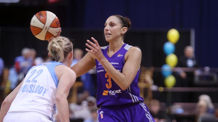 Sep 12, 2014; Chicago, IL, USA; Phoenix Mercury guard Diana Taurasi (3) passes the ball away from Chicago Sky guard Courtney Vandersloot (22) during the first quarter in game three of the 2014 WNBA Finals at UIC Pavilion. Mandatory Credit: Jerry Lai-Imagn Images
