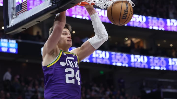 Dec 13, 2023; Salt Lake City, Utah, USA; Utah Jazz center Walker Kessler (24) dunks the ball against the New York Knicks during the third quarter at Delta Center. Mandatory Credit: Rob Gray-USA TODAY Sports