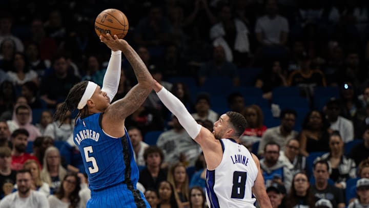 Mar 29, 2025; Orlando, Florida, USA; Orlando Magic forward Paolo Banchero (5) shoots the ball over Sacramento Kings guard/forward Zach LaVine (8) in the second quarter at Kia Center. Mandatory Credit: Jeremy Reper-Imagn Images Mar 29, 2025; Orlando, Florida, USA; Orlando Magic forward Paolo Banchero (5) shoots the ball over Sacramento Kings guard/forward Zach LaVine (8) in the second quarter at Kia Center. Mandatory Credit: Jeremy Reper-Imagn Images