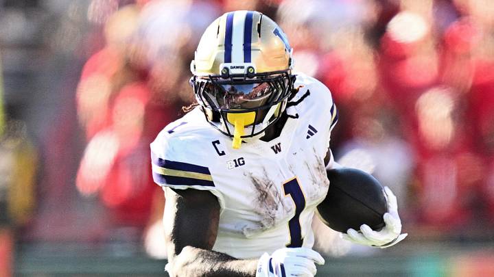 Oct 4, 2025; College Park, Maryland, USA;  Washington Huskies running back Jonah Coleman (1) carries the ball against the Maryland Terrapins at SECU Stadium. Mandatory Credit: Jamie Sabau-Imagn Images