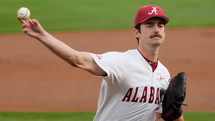 Tyler Fay pitches at Sewell-Thomas Stadium as the Crimson Tide and Auburn Tigers played the first game of their three-game series.