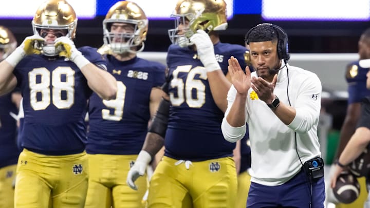 Jan 20, 2025; Atlanta, GA, USA; Notre Dame Fighting Irish head coach Marcus Freeman against the Ohio State Buckeyes during the CFP National Championship college football game at Mercedes-Benz Stadium. Mandatory Credit: Mark J. Rebilas-Imagn Images Jan 20, 2025; Atlanta, GA, USA; Notre Dame Fighting Irish head coach Marcus Freeman against the Ohio State Buckeyes during the CFP National Championship college football game at Mercedes-Benz Stadium. Mandatory Credit: Mark J. Rebilas-Imagn Images