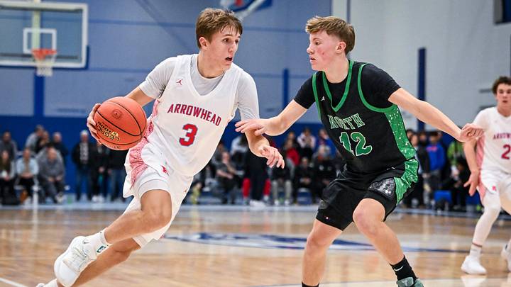 Arrowhead guard Trey Resch (3) drives against Oshkosh North guard Jackson Anderson in a game in the Rick Majerus WBY Shootout on Friday, December 27, 2024, at Concordia University in Mequon, Wisconsin. 