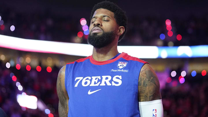 Dec 30, 2024; Portland, Oregon, USA; Philadelphia 76ers forward Paul George (8) stands for the National Anthem before the game against the Portland Trail Blazers at Moda Center. Mandatory Credit: Soobum Im-Imagn Images Dec 30, 2024; Portland, Oregon, USA; Philadelphia 76ers forward Paul George (8) stands for the National Anthem before the game against the Portland Trail Blazers at Moda Center. Mandatory Credit: Soobum Im-Imagn Images
