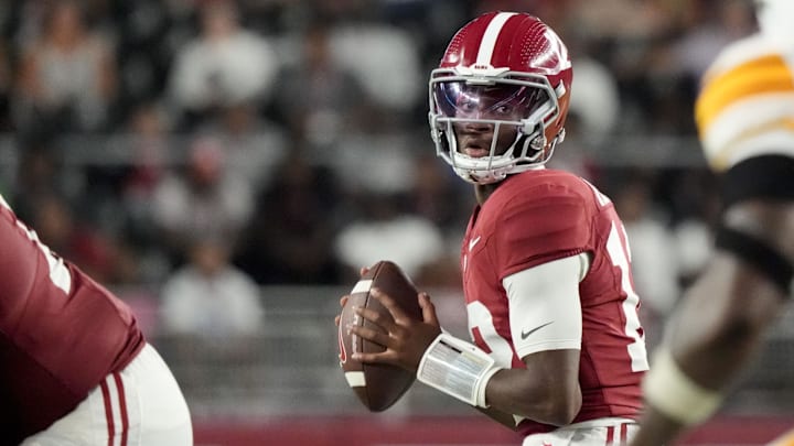 Sep 6, 2025; Tuscaloosa, Alabama, USA;  Alabama quarterback Keelon Russell (12) drops back to pass against UL Monroe at Saban Field at Bryant-Denny Stadium. Alabama defeated UL Monroe 73-0. Mandatory Credit: Gary Cosby Jr.-Imagn Images