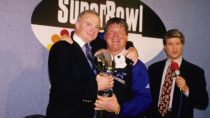 Dallas Cowboys owner Jerry Jones and head coach Jimmy Johnson with the Lombardi trophy after defeating the Buffalo Bills 