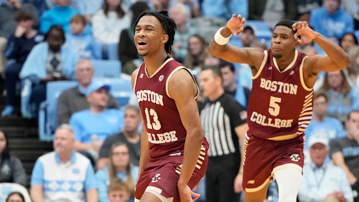 Jan 25, 2025; Chapel Hill, North Carolina, USA; Boston College Eagles guard Donald Hand Jr. (13) reacts with guard Fred Payne (5) after scoring in the second half at Dean E. Smith Center. Mandatory Credit: Bob Donnan-Imagn Images Jan 25, 2025; Chapel Hill, North Carolina, USA; Boston College Eagles guard Donald Hand Jr. (13) reacts with guard Fred Payne (5) after scoring in the second half at Dean E. Smith Center. Mandatory Credit: Bob Donnan-Imagn Images