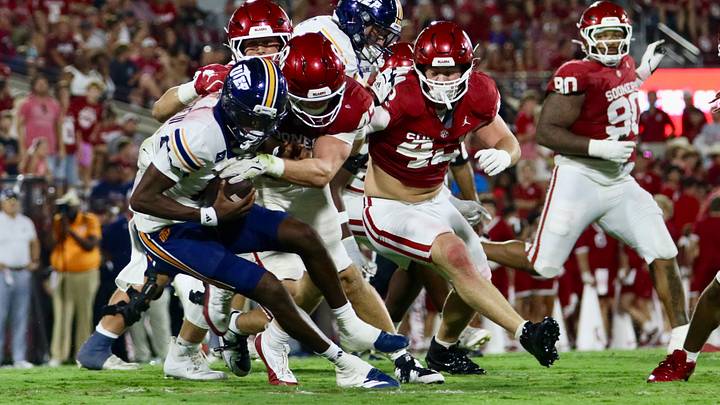 Oklahoma linebacker James Nesta tries to sack UTEP quarterback Raymond Moore III. Oklahoma linebacker James Nesta tries to sack UTEP quarterback Raymond Moore III.