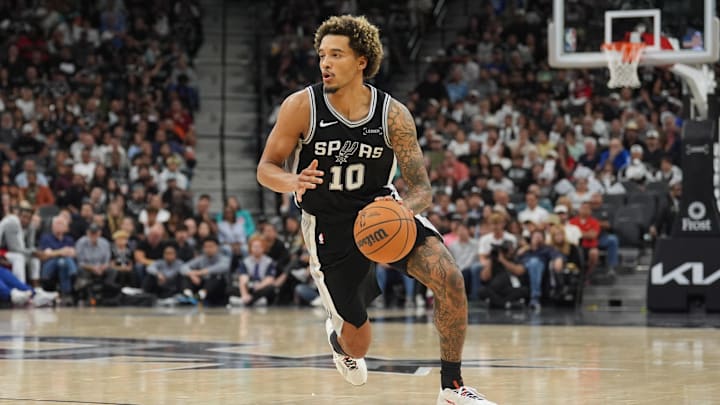 Nov 8, 2025; San Antonio, Texas, USA;  San Antonio Spurs forward Jeremy Sochan (10) dribbles in the second half against the New Orleans Pelicans at Frost Bank Center. Mandatory Credit: Daniel Dunn-Imagn Images