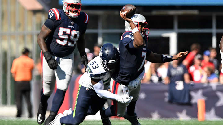 Sep 15, 2024; Foxborough, Massachusetts, USA; Seattle Seahawks linebacker Boye Mafe (53) sacks New England Patriots quarterback Jacoby Brissett (7) during the second half at Gillette Stadium. Sep 15, 2024; Foxborough, Massachusetts, USA; Seattle Seahawks linebacker Boye Mafe (53) sacks New England Patriots quarterback Jacoby Brissett (7) during the second half at Gillette Stadium.