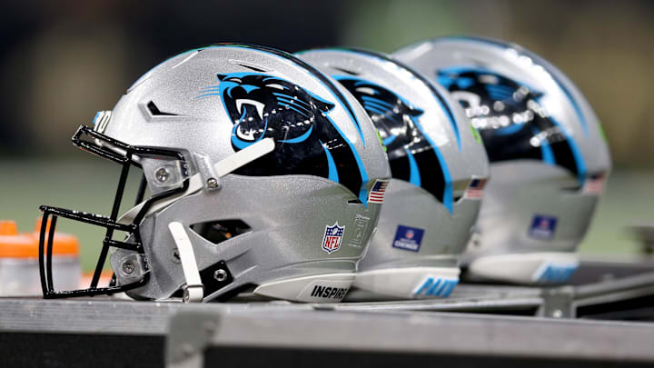 Jan 2, 2022; New Orleans, Louisiana, USA; Carolina Panthers helmets on the sidelines in the second quarter of their game against the Carolina Panthers at the Caesars Superdome. Mandatory Credit: Chuck Cook-Imagn Images