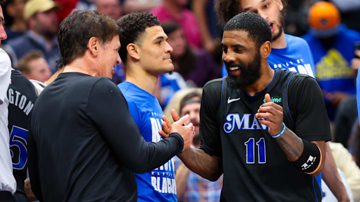 Feb 22, 2024; Dallas, Texas, USA;  Dallas Mavericks guard Kyrie Irving (11) celebrates with Mark Cuban during the second half against the Phoenix Suns at American Airlines Center. Mandatory Credit: Kevin Jairaj-Imagn Images