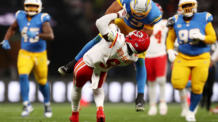 [US, Mexico & Canada customers only] Sep 5, 2025; Sao Paulo, BRAZIL; Los Angeles Chargers linebacker Troy Dye (43) runs against Kansas City Chiefs wide receiver JuJu Smith-Schuster (9) in the first half during a NFL game at Corinthians Arena. Mandatory Credit: Jean Carniel/Reuters via Imagn Images